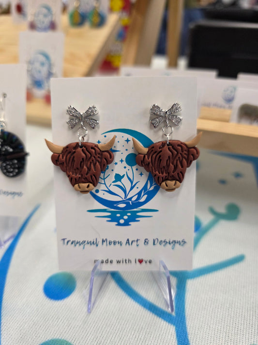 Adorable Highland Cows with bows